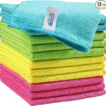 A stack of microfiber cleaning cloths in different colors.