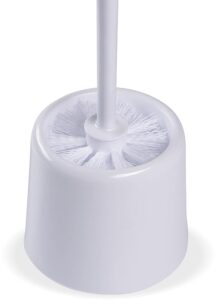 A white toilet brush with a long handle.